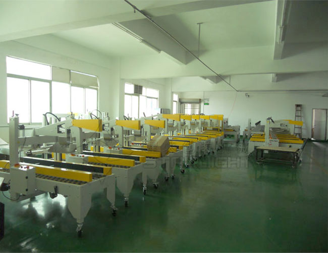 haha体育折盖封箱打包机